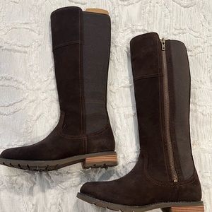 Ariat (just below the knee high boots) Never worn